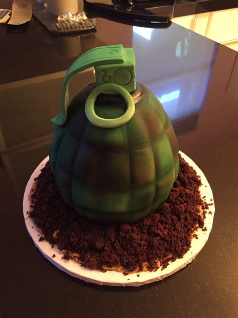 This army themed birthday consists of an army tank cake on top of a base cake with army boy, trucks, planes, rifles and grenade cupcakes. Grenade Army Birthday Cake - Yelp