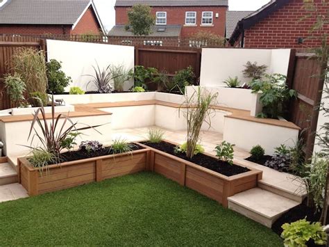 A path curves through a garden packed with cottage garden favourites. Integral bench seating/storage lush garden design modern ...