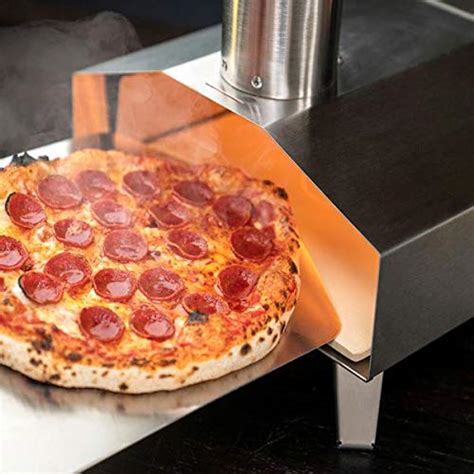Cooking at temperatures of over 930 degrees fahrenheit (much hotter than your standard in house oven) allows you to achieve a crisp outside, tender inside and. Ooni 3 Portable Wood Pellet Pizza Oven W/ Stone and Peel ...