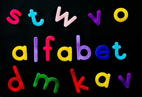 Assorted Color Alfabet Letters On Black Background · Free Stock Photo