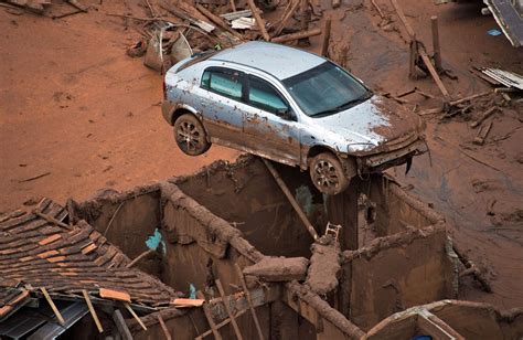 Two Dams Burst Releasing A Deadly Flood Of Red Dam Brazil