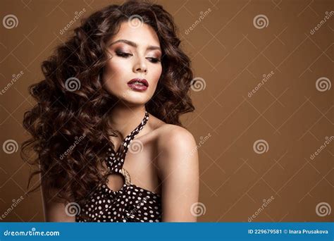 Beauty Curly Hair Woman With Perfect Smokey Eyes Makeup And Lips