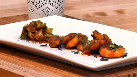 Jumbo shrimp tikka masala with basmati rice, peas, and chard. Shrimp Tikka Masala | Marc and Mandy Show