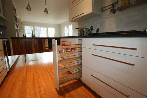 When you're determining an ideal projection for cabinet pulls, open your cabinets and see how close they swing to each other and surrounding kitchen objects. Spice Storage and Organization - Help Your Shelves