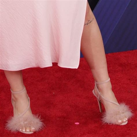 She has attained several charting singles on the uk singles chart. Anne-Marie's Sexy Feet in Racey Feathered Heeled Sandals ...