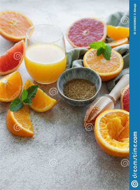 Glass Of Juice And Citrus Fruits Stock Photo Image Of Delicious