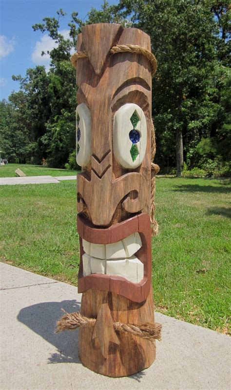 Totem poles, the traditional wooden structures with artistic carvings, have always fascinated adults and children alike. This item is unavailable | Etsy | Tiki totem, Tiki statues ...