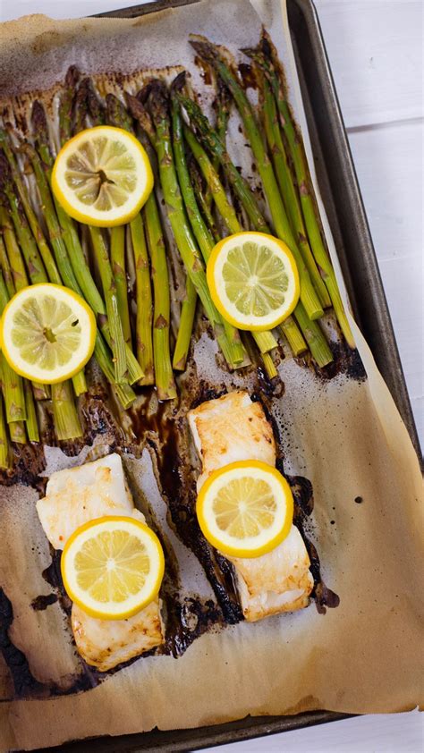 Sea Bass Asparagus And Lemon One Sheet Pan Meal Recipe Sheet Pan Meals Healthy Sheet Pan