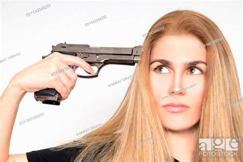 Desperate Blond Woman Holds The Gun To Her Head Stock Photo Picture