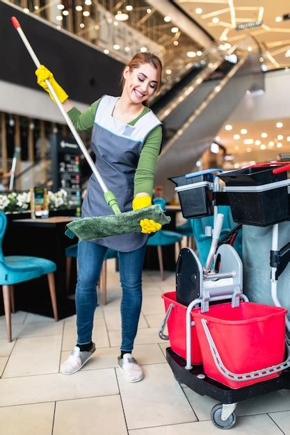 Premium Photo Beautiful Young Woman Cleaning At Shopping Mall