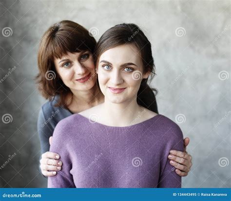 Happy Senior Mother Embracing Adult Daughter Laughing Together Stock Image Image Of Girl
