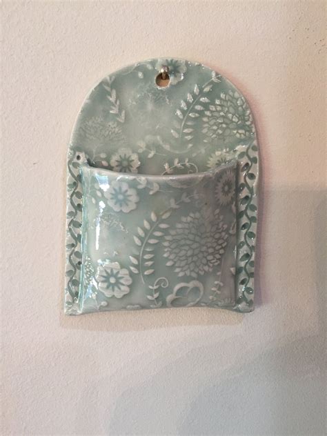 Wall Pocket Ceramic Wall Pocket Pale Green Wall Planter With Flowers