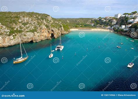 View On On The Beach Cala En Porter With White Boats Menorca Stock