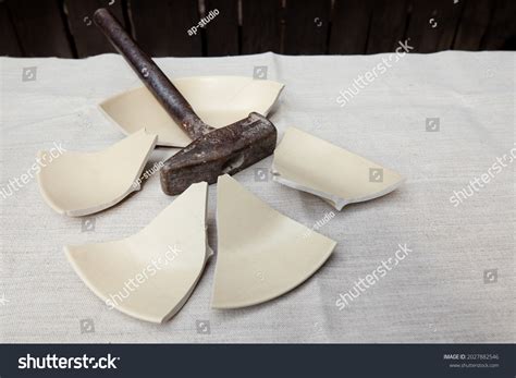 Broken Plate Metal Hammer Lying On Stock Photo 2027882546 Shutterstock