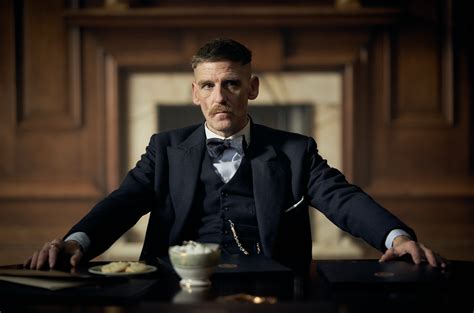 The look features tidily trimmed sides that taper into a longer length on top. Arthur Shelby: Actor Nailing Peaky Blinders