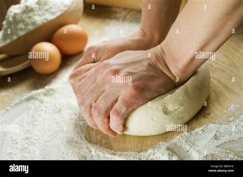 Kneading The Dough Stock Photo - Alamy