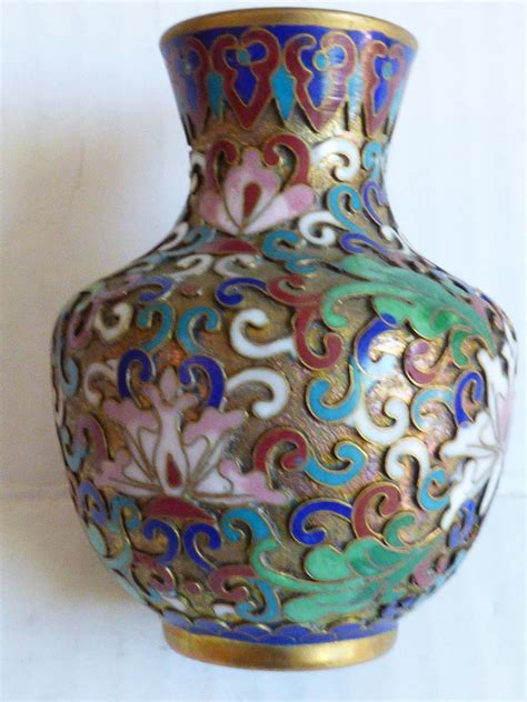 Our golden metal vase set is a perfect romantic addition to any bedroom or a gift to be adored by the bronze rose gold wiring is very sturdy and the glass tube that the water and rose goes in fits. Chinese Oriental Gold Metal Mix Color Floral design Enamel ...