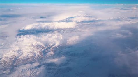 Airplane Flying Over Snowy Mountains Stock Footage Videohive