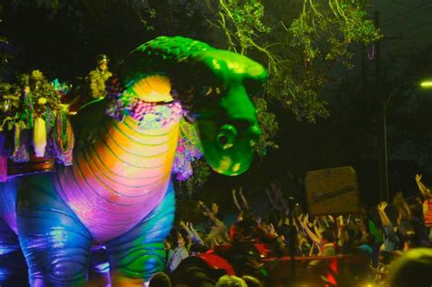 Thousands turn out for sydney parade. Brontasaurous float | Mardi gras, Float