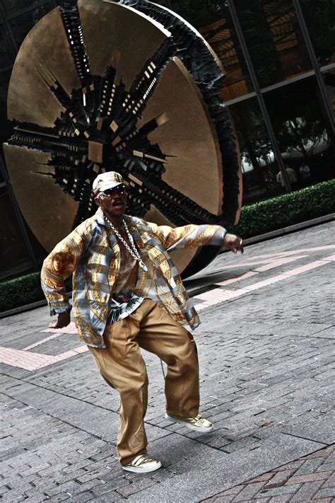 A Man Dances In Downtown Charlotte North Carolina During The