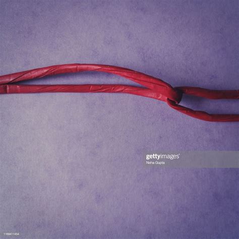Red Ropes Knotted Together Purple Background Purple Backgrounds