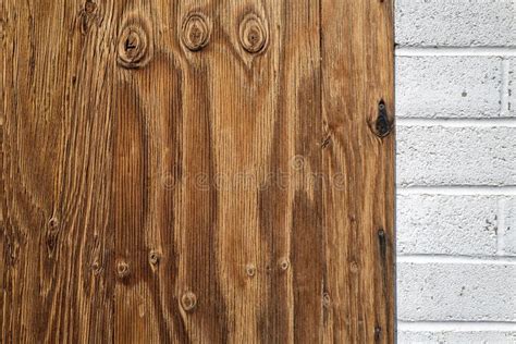 Detail Of A Boarded Up White Brick Wall Of An Abandoned Building Stock