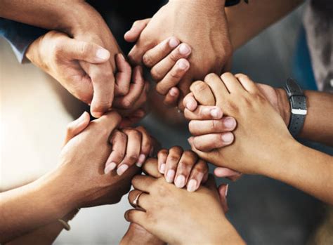 Group Of People Holding Hands Stock Photos Pictures And Royalty Free