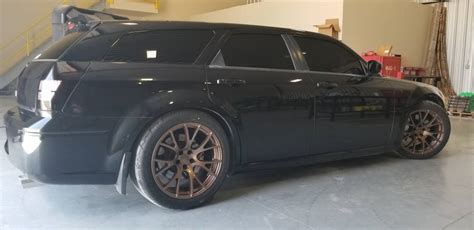 Might have been with help from dodge since they are sponsored by them but i'm pretty sure they did it earlier. Why won't Hellcat replica wheels fit '07 Magnum SRT8?