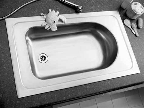 I lov this it's just ideal for a quick bath in the sink. Stainless steel inset baby bath