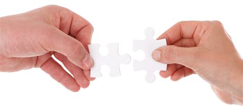 Hand Connect Two Puzzle Pieces Png Image Purepng Free Transparent