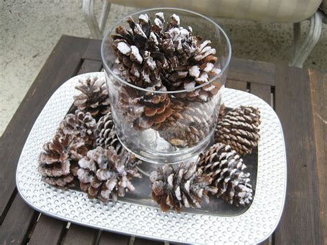 Dahlia + roses + pine cones winter wedding bouquet i like this but i think it would be prettier with little ...