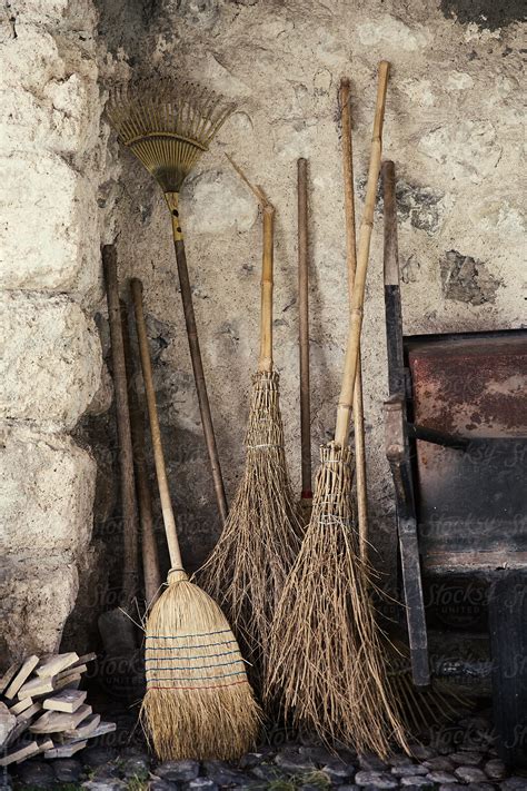 Collection Of Old Fashioned Brooms Stocksy United