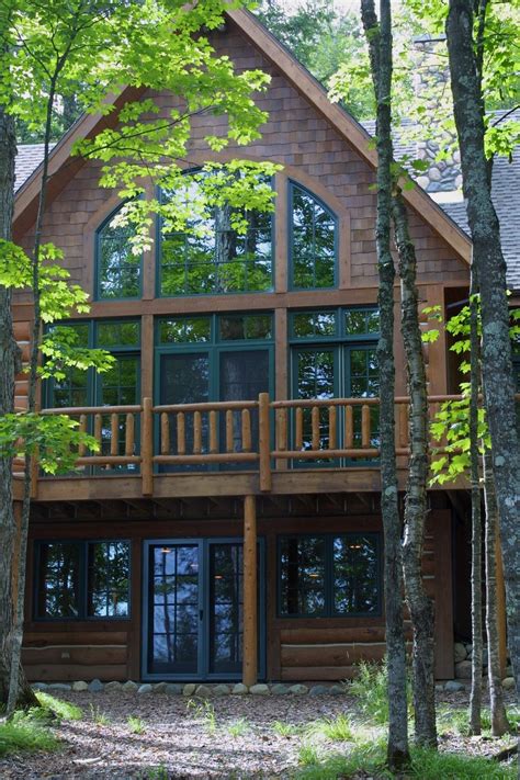 Large Windows Facing The Lake Are Alway A Feature Homeowners Like
