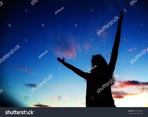 Woman Staying With Raised Hands At The Sunset Time Stock Photo Shutterstock