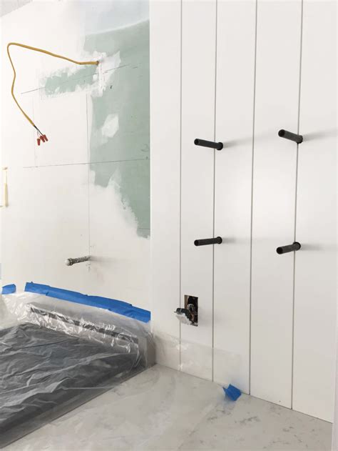 Learn more about the design trend and if you're installing the shiplap boards around a door, take off the door casing and reinstall it after. How To Install A Vertical Shiplap Backsplash | A Nod to ...
