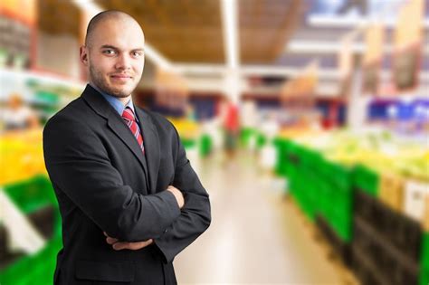 Premium Photo Portrait Of Happy Male Shopkeeper