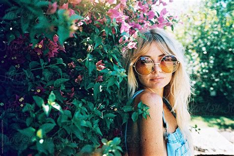 Portrait Of Blonde Girl With Sunglasses Outside By Stocksy