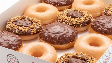 Krispy Kreme Collaborates With Snickers To Release New Doughnuts News