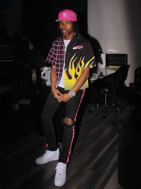 Lil Baby Wearing A Neon Pink Amiri Prada And Nike Outfit Incorporated