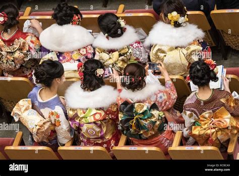japanese girls dressed in colorful kimonos attend the coming of age day celebration ceremony at