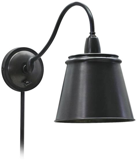 Choose from swing arms and fixed wall sconces that allow you to put the light right where you need it. Oiled Bronze Plug-In Wall Light