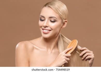 Charming Blonde Naked Woman Combing Long Stock Photo Shutterstock