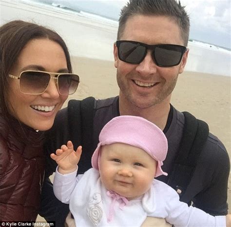 Kyly And Michael Clarke Take A Winter Stroll Along The Beach With