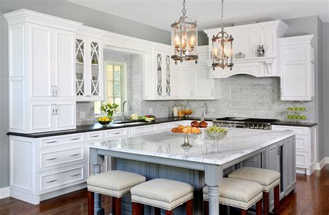 Bright, white cabinets bounce light and make for a modern kitchen. Traditional Formal White and Grey Kitchen - Crystal Cabinets