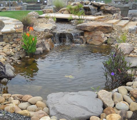 Water Feature Includes Pond Boulders And Natural Stone Fountains