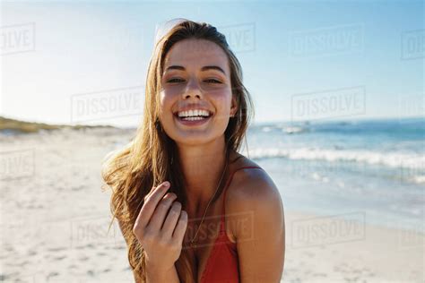 Portrait Of Smiling Babe Woman On The Beach On A Sunny Day Babe Caucasian Female Model In