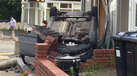 Overturned Car Hits Shop On Birminghams Pershore Road Bbc News