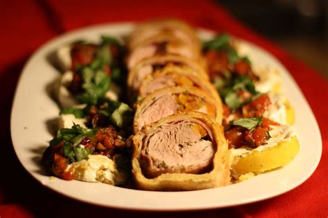 Stuffed Pork Wellington With Grilled Polenta And Tomato Basil Drizzle