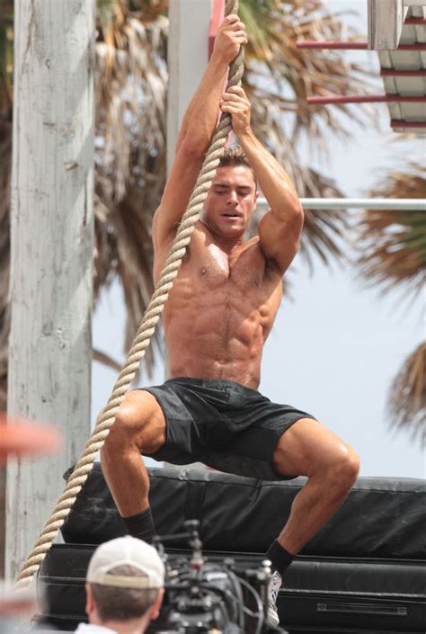 Zac Efron Looks Ripped As He Goes Shirtless To Complete Obstacle Course