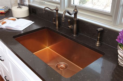 The Copper Sink Is A Great Contrast In This All White Kitchen With